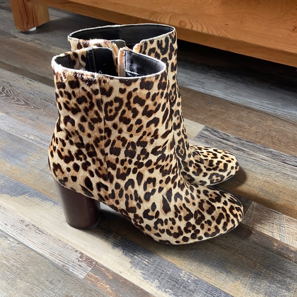 Cheetah print heeled boots. Size 7.5